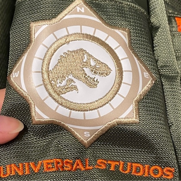 2023 BRAND NEW EDITION Universal studios GREEN Jurassic Park Backpack - Picture 5 of 16